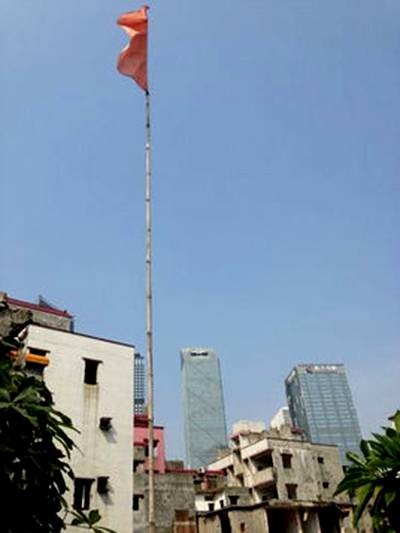 广东百亿村官外逃案