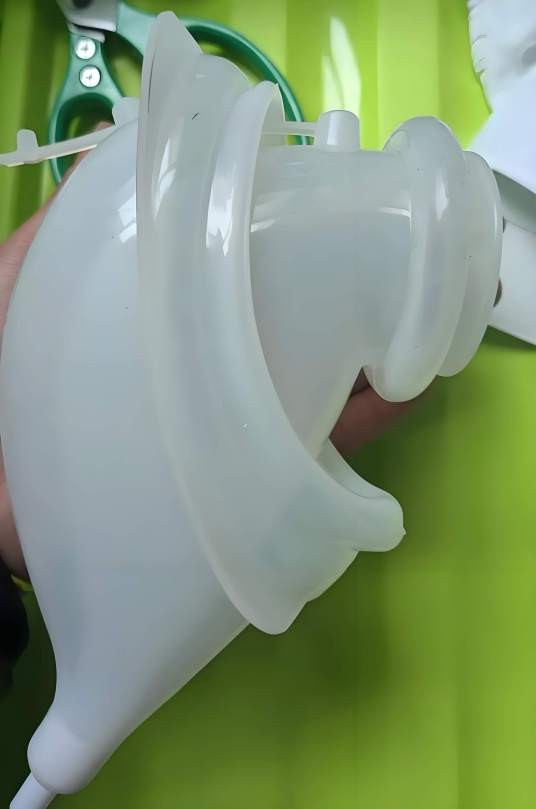 接尿器