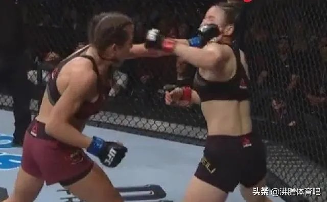 张伟丽和乔安娜的UFC冠军赛中,乔安娜一度像稳拿冠军一样笑着炫耀,具体是怎么回事?